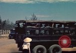 Image of traffic on road Vietnam, 1965, second 37 stock footage video 65675064025