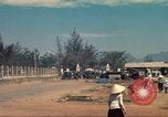 Image of traffic on road Vietnam, 1965, second 42 stock footage video 65675064025