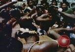 Image of Pacific islanders climb trees and repair nets Pacific Theater, 1944, second 25 stock footage video 65675064073