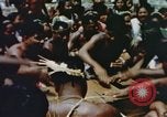 Image of Pacific islanders climb trees and repair nets Pacific Theater, 1944, second 26 stock footage video 65675064073
