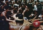 Image of Pacific islanders climb trees and repair nets Pacific Theater, 1944, second 27 stock footage video 65675064073