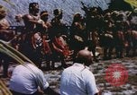 Image of Pacific islanders climb trees and repair nets Pacific Theater, 1944, second 30 stock footage video 65675064073