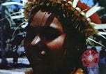 Image of Pacific islanders climb trees and repair nets Pacific Theater, 1944, second 34 stock footage video 65675064073