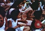 Image of Pacific islanders climb trees and repair nets Pacific Theater, 1944, second 39 stock footage video 65675064073