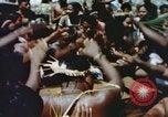 Image of Pacific islanders climb trees and repair nets Pacific Theater, 1944, second 43 stock footage video 65675064073