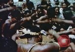 Image of Pacific islanders climb trees and repair nets Pacific Theater, 1944, second 44 stock footage video 65675064073