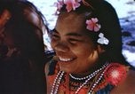 Image of Pacific islanders climb trees and repair nets Pacific Theater, 1944, second 53 stock footage video 65675064073