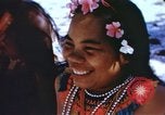 Image of Pacific islanders climb trees and repair nets Pacific Theater, 1944, second 54 stock footage video 65675064073