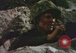 Image of US Marines in combat on Pacific island Pacific Theater, 1944, second 27 stock footage video 65675064074