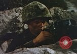 Image of US Marines in combat on Pacific island Pacific Theater, 1944, second 28 stock footage video 65675064074