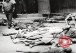 Image of dead bodies Germany, 1945, second 4 stock footage video 65675064121