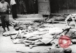Image of dead bodies Germany, 1945, second 5 stock footage video 65675064121