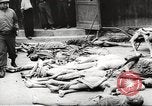 Image of dead bodies Germany, 1945, second 6 stock footage video 65675064121