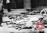 Image of dead bodies Germany, 1945, second 7 stock footage video 65675064121