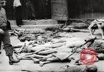 Image of dead bodies Germany, 1945, second 8 stock footage video 65675064121