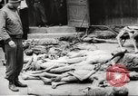 Image of dead bodies Germany, 1945, second 9 stock footage video 65675064121