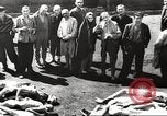 Image of dead bodies Germany, 1945, second 14 stock footage video 65675064121