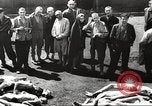 Image of dead bodies Germany, 1945, second 15 stock footage video 65675064121