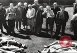 Image of dead bodies Germany, 1945, second 16 stock footage video 65675064121