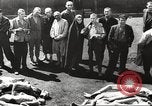 Image of dead bodies Germany, 1945, second 17 stock footage video 65675064121
