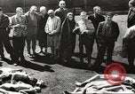 Image of dead bodies Germany, 1945, second 18 stock footage video 65675064121
