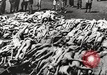 Image of dead bodies Germany, 1945, second 22 stock footage video 65675064121