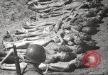 Image of dead bodies Germany, 1945, second 36 stock footage video 65675064121
