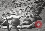 Image of dead bodies Germany, 1945, second 37 stock footage video 65675064121