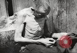 Image of dead bodies Germany, 1945, second 60 stock footage video 65675064121