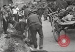 Image of dead bodies Germany, 1945, second 15 stock footage video 65675064122