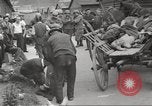 Image of dead bodies Germany, 1945, second 16 stock footage video 65675064122