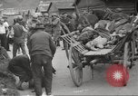 Image of dead bodies Germany, 1945, second 17 stock footage video 65675064122