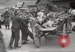 Image of dead bodies Germany, 1945, second 21 stock footage video 65675064122