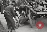 Image of dead bodies Germany, 1945, second 31 stock footage video 65675064122
