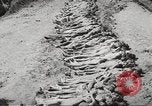 Image of dead bodies Germany, 1945, second 17 stock footage video 65675064123