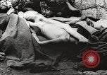 Image of dead bodies Germany, 1945, second 25 stock footage video 65675064123