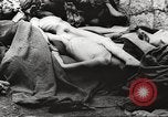 Image of dead bodies Germany, 1945, second 27 stock footage video 65675064123