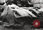 Image of dead bodies Germany, 1945, second 29 stock footage video 65675064123