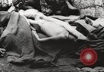 Image of dead bodies Germany, 1945, second 31 stock footage video 65675064123