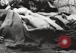 Image of dead bodies Germany, 1945, second 33 stock footage video 65675064123
