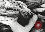 Image of dead bodies Germany, 1945, second 38 stock footage video 65675064123