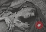 Image of dead bodies Germany, 1945, second 56 stock footage video 65675064123