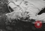 Image of dead bodies Germany, 1945, second 58 stock footage video 65675064123
