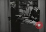 Image of man and woman work in office Washington DC USA, 1940, second 43 stock footage video 65675064156