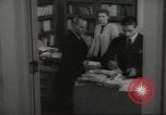 Image of man and woman work in office Washington DC USA, 1940, second 44 stock footage video 65675064156
