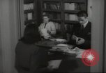 Image of man and woman work in office Washington DC USA, 1940, second 49 stock footage video 65675064156