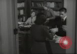 Image of man and woman work in office Washington DC USA, 1940, second 50 stock footage video 65675064156