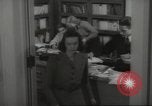 Image of man and woman work in office Washington DC USA, 1940, second 51 stock footage video 65675064156