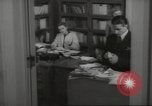 Image of man and woman work in office Washington DC USA, 1940, second 53 stock footage video 65675064156