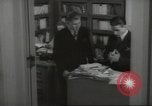 Image of man and woman work in office Washington DC USA, 1940, second 54 stock footage video 65675064156